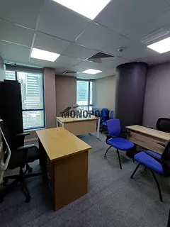 A fully furnished office in a prime location, ready for immediate occupancy, featuring luxurious fin
