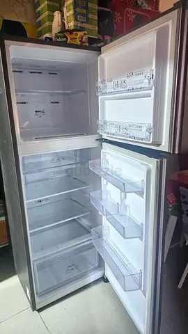 Used double-door refrigerator in good working condition