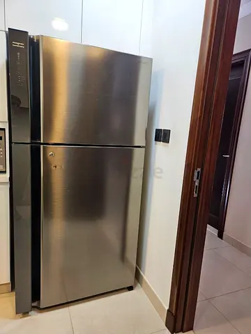 Stainless Steel Top-Freezer Refrigerator - Good Working Condition