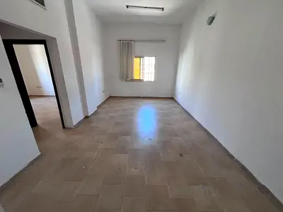 Spacious one-bedroom apartment, comfortable living room, one bathroom, separate kitchen, central air conditioning, Al Nuaimiya 3 area, Ajman