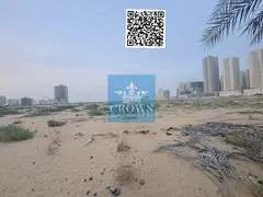 Landmark Development Opportunity: G+24 Freehold Plot in Global City, Al Alia – Ajman