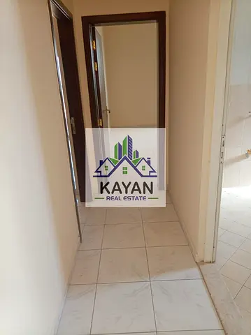 2BHK in Al Raas, UAQ, 2 baths, open view, near beach & services, family building.