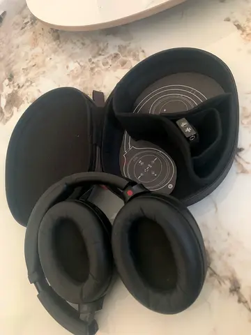 Sony over-ear wireless noise cancelling headphones with hard case (used)