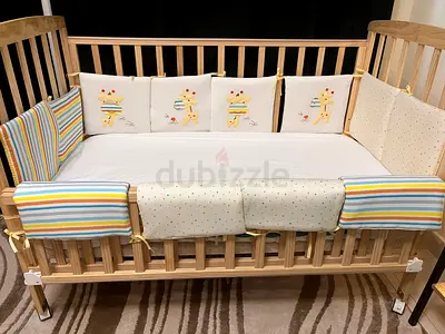 Wooden Baby Crib with Padded Bumpers