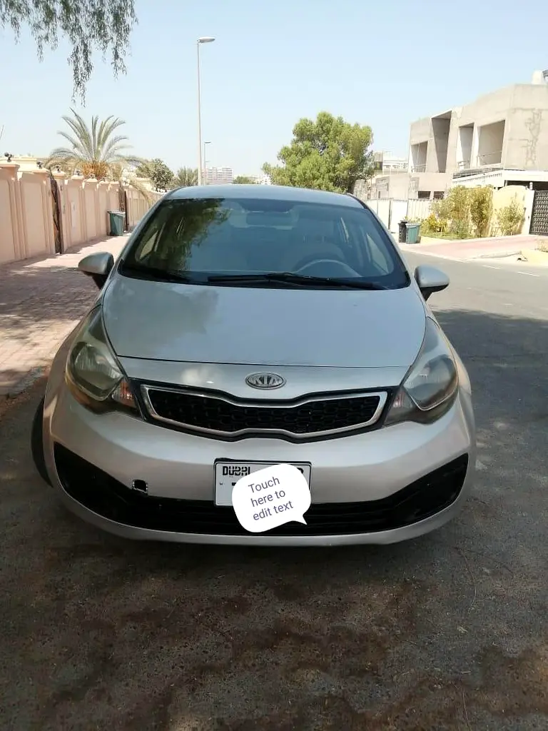 Kia Rio 2013 — photo 1 of 7