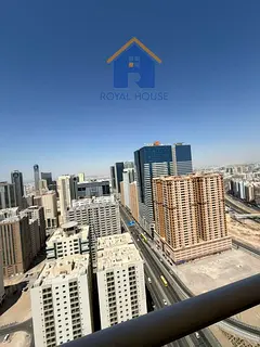 For Sale: Two-bedroom apartment with a living room, maid's room, and fully furnished in Al Nahda, Sh