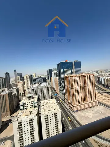 For Sale: Two-bedroom apartment with a living room, maid's room, and fully furnished in Al Nahda, Sharjah.