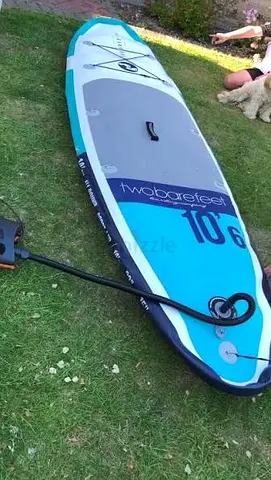 Inflatable Stand Up Paddleboard (SUP) with Paddle and Life Vest - Good Condition