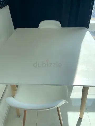 White Dining Table with Matching Chairs - Compact, Modern
