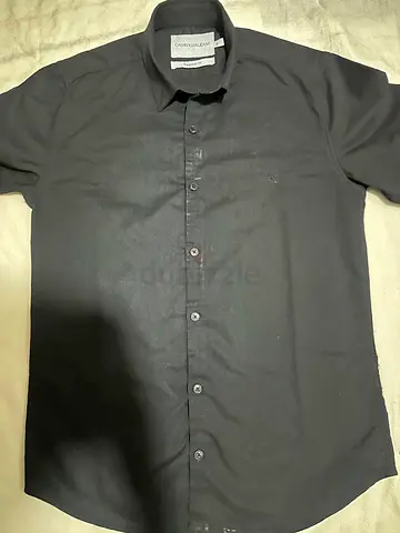 Black long-sleeve button-up shirt, good condition