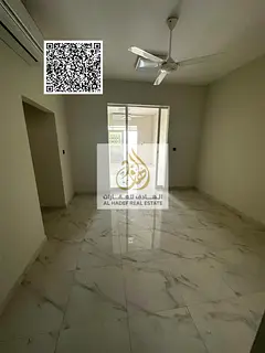 Two-bedroom apartment with a living room, annual rent, including a majlis (formal sitting room) and