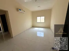 A room and a hall for annual rent in Al Rawda 1 - Ajman | Spacious spaces and a great location next