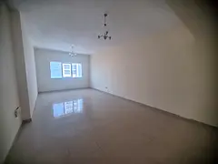 Three bedrooms and a living room for annual rent in Sharjah | Free air conditioning | Built-in wardr