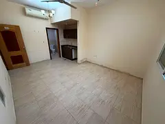 Studio apartment, second row from the Corniche, split AC, prime location with easy access to Sharjah