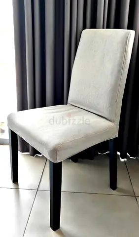 Light grey upholstered Ikea chair with black wooden legs - single. Washable cover. New condition