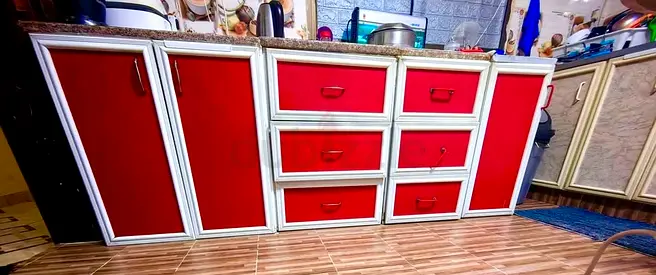 White Frame Wall Cabinet with Red Doors - Good Condition