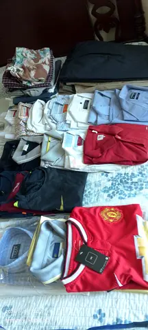 Bulk lot of mens shirts and polos - mixed sizes, new and preowned