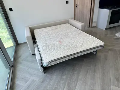 Italian comodo two seater sofa bed with mattress