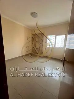 For annual rent in Al Nahda, Sharjah, a distinctive 3 =-bedroom apartment with a living room is avai