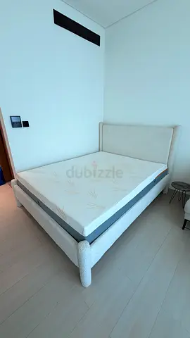 Single upholstered bed frame with mattress - light beige