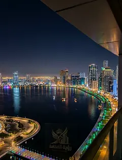 Charming sea view in Al Majaz 3 Luxury apartment with 3 rooms, a hall, a maid’s room and a very sp