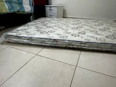 Used Double Mattress - Firm, Clean, Plastic Covered