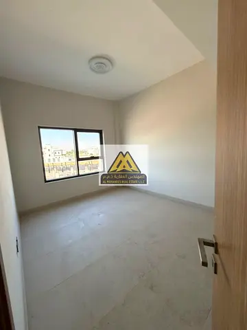 Spacious apartment | Prime location in Al Zahia, Ajman | Balcony | Split air conditioning | Semi-open kitchen | Vibrant location close to all services