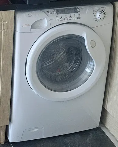 Front load washing/dryer machine - good working condition