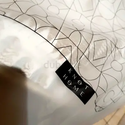 Brand new 4-pc KNOT HOME Patterned Cushions Set. Vacuum Packed. Brandnew. Worth Over AED 1,200.