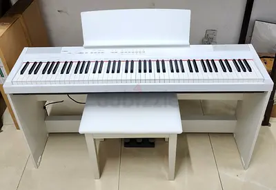 The Yamaha P-105 is a highly portable, 88-key digital piano renowned for combining authentic grand