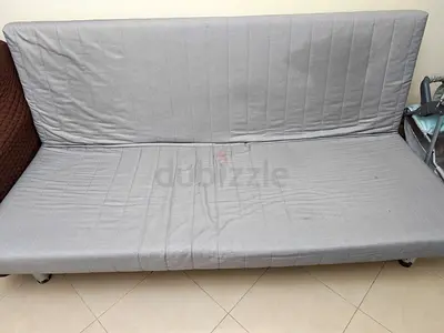 Grey foldable sofa bed — good condition