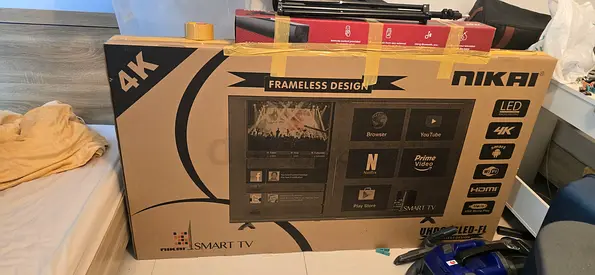 NIKAI 65 4K QLED Smart TV (Google TV) - Excellent Condition With Nikai free speakers