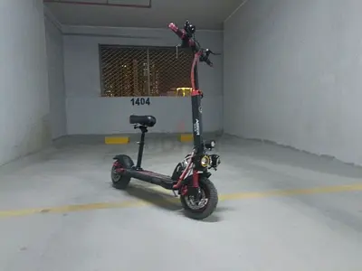 Electric Scooter with Seat — Good Condition, Ready to Ride, also has Bluetooth, led lights, signals