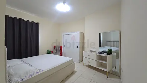 Spacious Master Bedroom for Rent - Close to Sahara Center, King Size Bed, Attached Bathroom, Parking