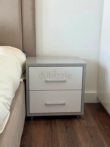 Modern Two Drawer Grey and White Nightstand bought both for 600 selling for 100