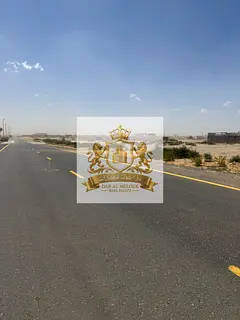 For sale in Sharjah Al-Houshi area A piece of land, investment housing Area 2745ft Free ownership fo