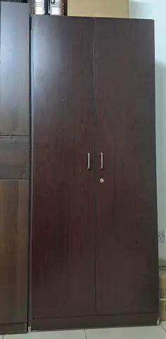 Dark wood two-door wardrobe with lock - good condition