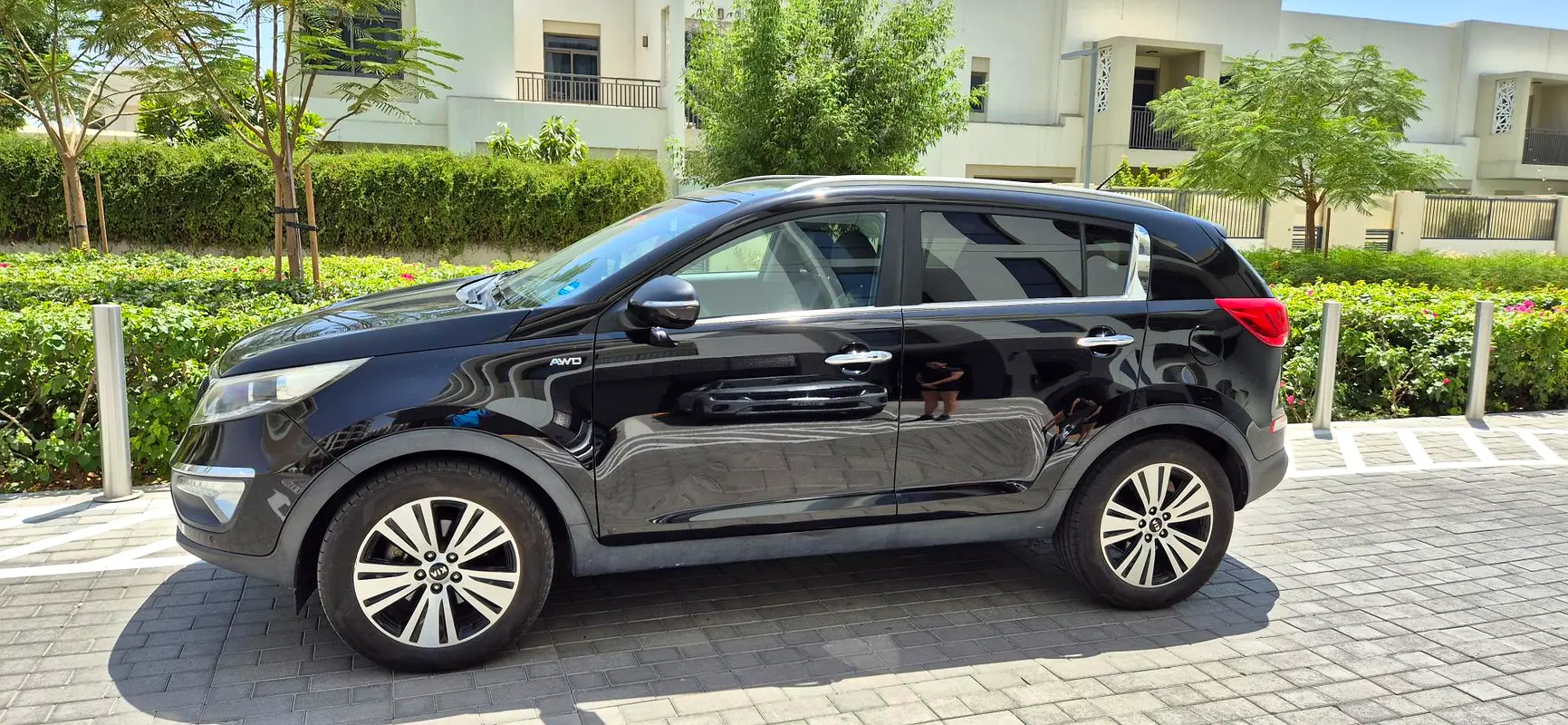 Kia Sportage 2015 — photo 1 of 14