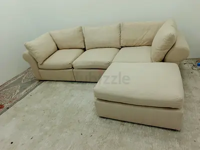 Pottery barn beige color feather 🪶 filled modular sofa with ottoman