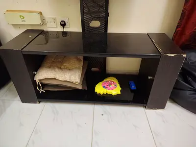 Low black TV stand / media console in used condition can hang any size led and lcd tv