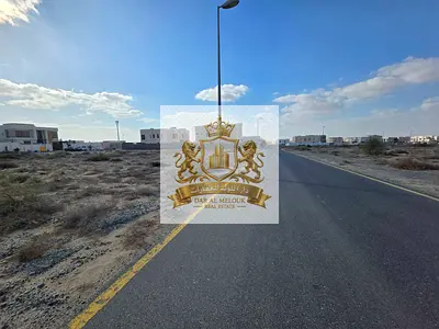 🔥 أرض زاوية نادرة بالرقيبة –بجوار الطي مول و  تملك حر للعرب وقريبة من دبي  و ثالث قطعه من الشارع الرئيسي 🔥