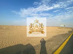 For sale in Sharjah Al Matraq area Residential investment plot, 3081 square feet Distinctive corner