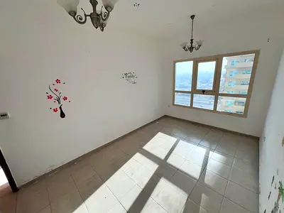 Luxury living in Al Amerah! One bedroom and living room in a prestigious tower, stunning views, central air conditioning, two bathrooms and a balcony,