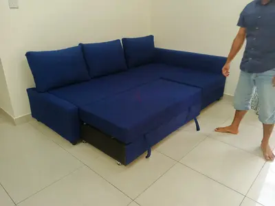 L-shaped navy blue fabric sectional sofa - good condition
