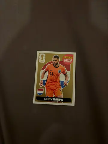 GOLD Cody Gakpo Extra Sticker - Panini World Cup 2026