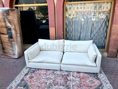 Marina home beige three seater sofa