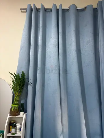 Light Blue Eyelet Curtains with Subtle Leaf Pattern
