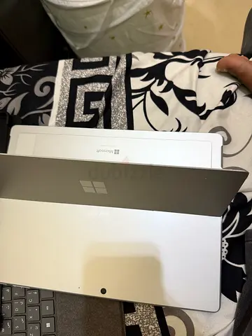 Microsoft Surface 11 Pro (silver) - Excellent Condition, C to usb dock free, mouse free, bag free.