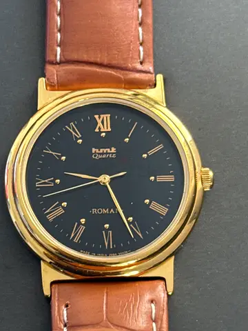 Rare HMT ROMAN gold-tone wristwatch with brown leather strap