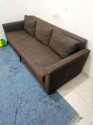 Sofa cum bed brown fabric in good condition